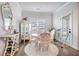 Charming dining room with elegant furniture, light walls, and luxury vinyl floors at 35 Henson Farm Dr, Loganville, GA 30052