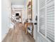Bright entryway featuring luxury floors, stylish mirror, and neutral paint colors at 35 Henson Farm Dr, Loganville, GA 30052