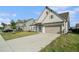 Well maintained single Gathering home with attractive landscaping and an attached garage at 35 Henson Farm Dr, Loganville, GA 30052