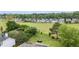 Large, lush backyard offers serenity with mature trees and views of the surrounding community at 5375 Glenhaven Dr, Cumming, GA 30041