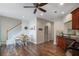 Kitchen dining area with breakfast table, staircase, and view of hallways at 5375 Glenhaven Dr, Cumming, GA 30041