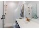 Bathroom featuring double glass enclosed shower, matte brass finishes and stylish sink at 1624 Gunnin Nw Trce, Atlanta, GA 30318