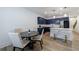 Modern kitchen features blue cabinets, white countertops, stainless steel appliances, and hardwood floors at 1624 Gunnin Nw Trce, Atlanta, GA 30318