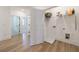View of the laundry room, from the hallway, featuring wire rack shelving and utility hookups at 1624 Gunnin Nw Trce, Atlanta, GA 30318