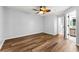 Spacious bedroom featuring hardwood floors, neutral walls and a modern ceiling fan at 3019 Camden Way, Alpharetta, GA 30005