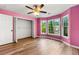 Bedroom showcasing a walk-in closet and natural light through the window at 3019 Camden Way, Alpharetta, GA 30005