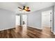 Spacious bedroom with hardwood floors, overhead fan, and walk in closet at 3019 Camden Way, Alpharetta, GA 30005