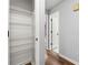 Organized storage: walk-in closet featuring multiple wire shelves at 3019 Camden Way, Alpharetta, GA 30005