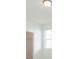 White bedroom with a closet with no doors at 5623 Meadowstone Walk, Kennesaw, GA 30152