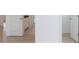 Bright hallway with wood flooring and white doors at 5623 Meadowstone Walk, Kennesaw, GA 30152