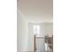Upstairs landing with wood railing and natural light at 5623 Meadowstone Walk, Kennesaw, GA 30152