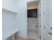 Hall tree and mud room with cabinets, and easy access to the garage at 5623 Meadowstone Walk, Kennesaw, GA 30152