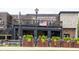 Horned Owl Brewing restaurant with an outdoor patio and nice landscaping at 5623 Meadowstone Walk, Kennesaw, GA 30152