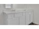 Bathroom vanity with double sinks, framed mirrors and marble countertops for a luxurious feel at 707 Ralph Still Rd, Dacula, GA 30019