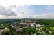 Expansive aerial view showcases the cityscape and lush green landscape of the neighborhood at 211 Colonial Homes Nw Dr # 1105, Atlanta, GA 30309