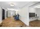 A hallway featuring mailboxes, elevator and comfortable waiting area with plush blue chairs at 211 Colonial Homes Nw Dr # 1105, Atlanta, GA 30309