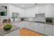 Modern kitchen with white cabinetry, granite countertops, and stainless steel appliances at 211 Colonial Homes Nw Dr # 1105, Atlanta, GA 30309
