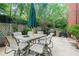 Patio with table, umbrella and grill at 211 Colonial Homes Nw Dr # 1105, Atlanta, GA 30309