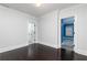 Bright, carpet free bedroom with white trim, neutral walls and dark hardwood flooring at 610 Valley Green Trce, Marietta, GA 30068