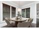Bright dining room with round table and upholstered chairs at 610 Valley Green Trce, Marietta, GA 30068
