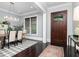 Inviting dining room featuring a modern chandelier, large window, and classic furnishings at 610 Valley Green Trce, Marietta, GA 30068