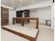 Spacious finished basement with game table, wet bar, and wood barn doors at 610 Valley Green Trce, Marietta, GA 30068