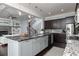 Open-concept kitchen with a large island and access to the living area at 610 Valley Green Trce, Marietta, GA 30068