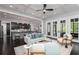 Open-concept living space featuring a kitchen, living room, and French doors leading to outdoor area at 610 Valley Green Trce, Marietta, GA 30068