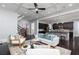 Open-concept living space showcasing a modern kitchen, living room, and access to outdoor area at 610 Valley Green Trce, Marietta, GA 30068