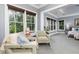 View of main bedroom with sitting area featuring large bright windows and view to sleeping area at 610 Valley Green Trce, Marietta, GA 30068