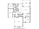 Main floor plan featuring an open kitchen, living room, dining room, garages, and laundry at 610 Valley Green Trce, Marietta, GA 30068