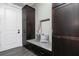 This mudroom has a convenient bench, storage cabinets, and hooks for organizing your belongings at 610 Valley Green Trce, Marietta, GA 30068