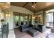 Comfortable screened porch with stone fireplace and modern outdoor furniture set at 610 Valley Green Trce, Marietta, GA 30068