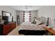 Cozy bedroom with a ceiling fan and neutral decor at 3440 Essex Ave # 103, Atlanta, GA 30339