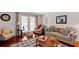 Cozy living room featuring hardwood floors and stylish, comfortable furnishings at 3440 Essex Ave # 103, Atlanta, GA 30339