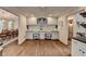 Shared home office with a generous built-in desk space at 443 Lakeshore Dr, Berkeley Lake, GA 30096