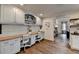 Built in Home Office featuring light blue cabinets, wood countertops, and ample storage at 443 Lakeshore Dr, Berkeley Lake, GA 30096