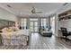 Bright main bedroom featuring a lounge area, workspace, and private patio at 443 Lakeshore Dr, Berkeley Lake, GA 30096