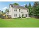 Two story house with sliding glass door and large level yard at 172 Mill Creek Dr, Canton, GA 30115