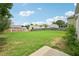 Large, level backyard with a partial fence at 172 Mill Creek Dr, Canton, GA 30115