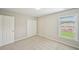 A bright bedroom with carpet and a closet at 172 Mill Creek Dr, Canton, GA 30115