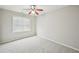 Neutral bedroom with carpet floors, a ceiling fan, and natural light at 172 Mill Creek Dr, Canton, GA 30115