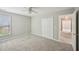 A bright bedroom with carpet and ceiling fan at 172 Mill Creek Dr, Canton, GA 30115