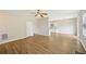 Open-concept living room with hardwood floors, seamlessly connected to the kitchen at 172 Mill Creek Dr, Canton, GA 30115