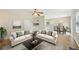 Stylish living room with hardwood floors, neutral colors, and comfortable seating at 172 Mill Creek Dr, Canton, GA 30115