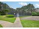 Well-maintained tennis courts surrounded by lush greenery, perfect for outdoor recreation at 172 Mill Creek Dr, Canton, GA 30115
