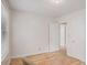 A bright bedroom features hardwood floors, a ceiling light, and closet space at 2447 Crestview Ave, Decatur, GA 30032