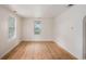 Bright living room with original hardwood floors, awaiting your personal touch at 2447 Crestview Ave, Decatur, GA 30032