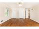 Bedroom featuring hardwood floors, two closets, a ceiling fan, and natural light at 295 Glen Lake Dr, Atlanta, GA 30327