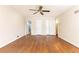Large bedroom with hardwood floors, neutral walls, and two closets at 295 Glen Lake Dr, Atlanta, GA 30327